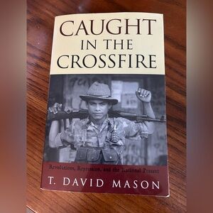 Caught in the Crossfire College Book